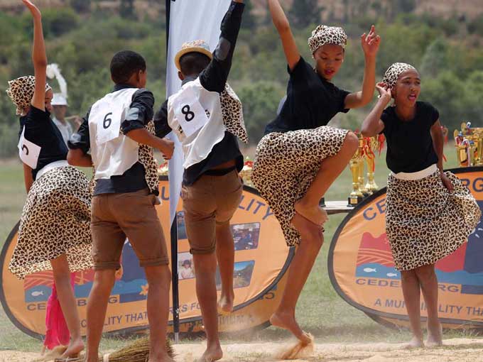 Traditional youth dancers posing before their performance